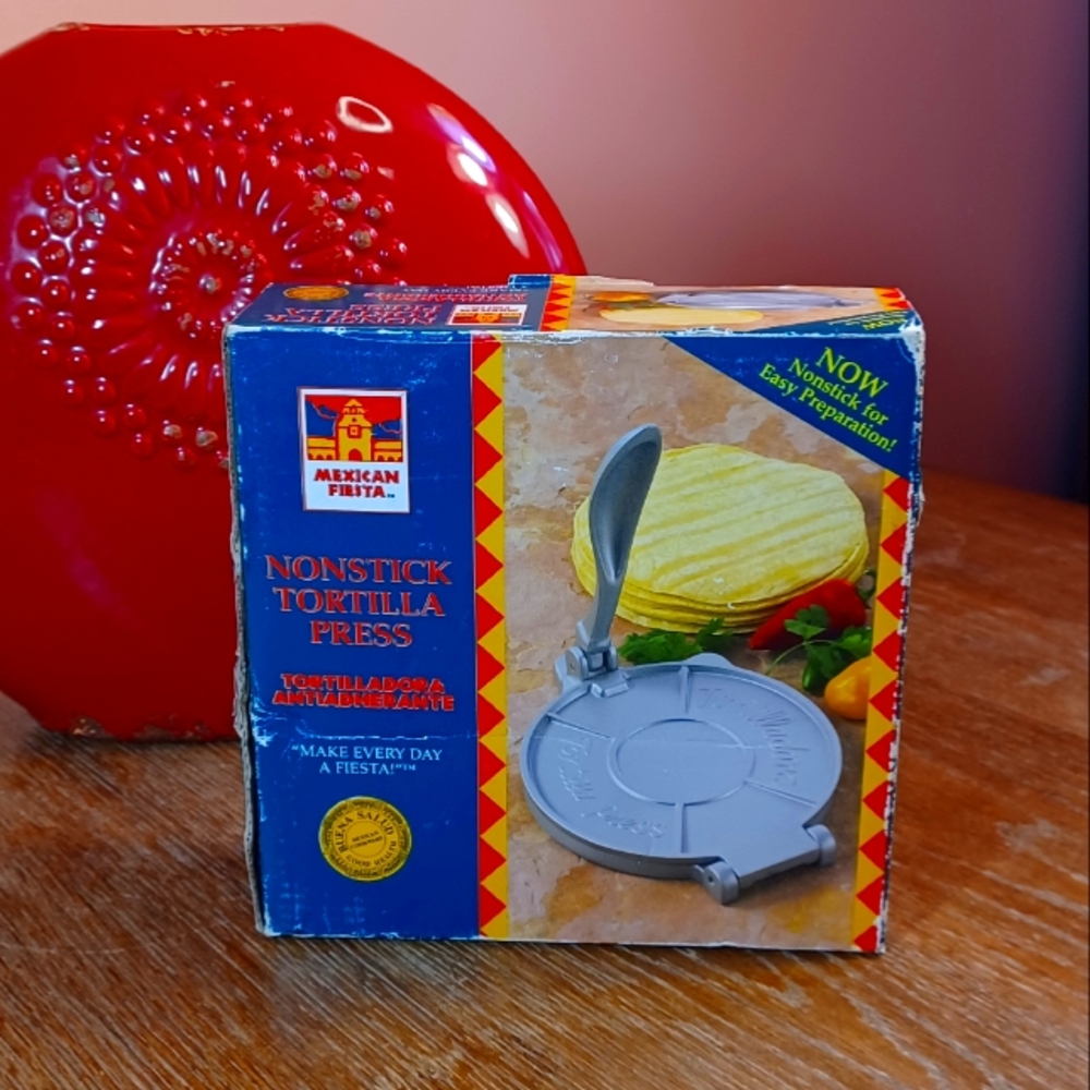 Non-stick tortilla press. Gently used with box.